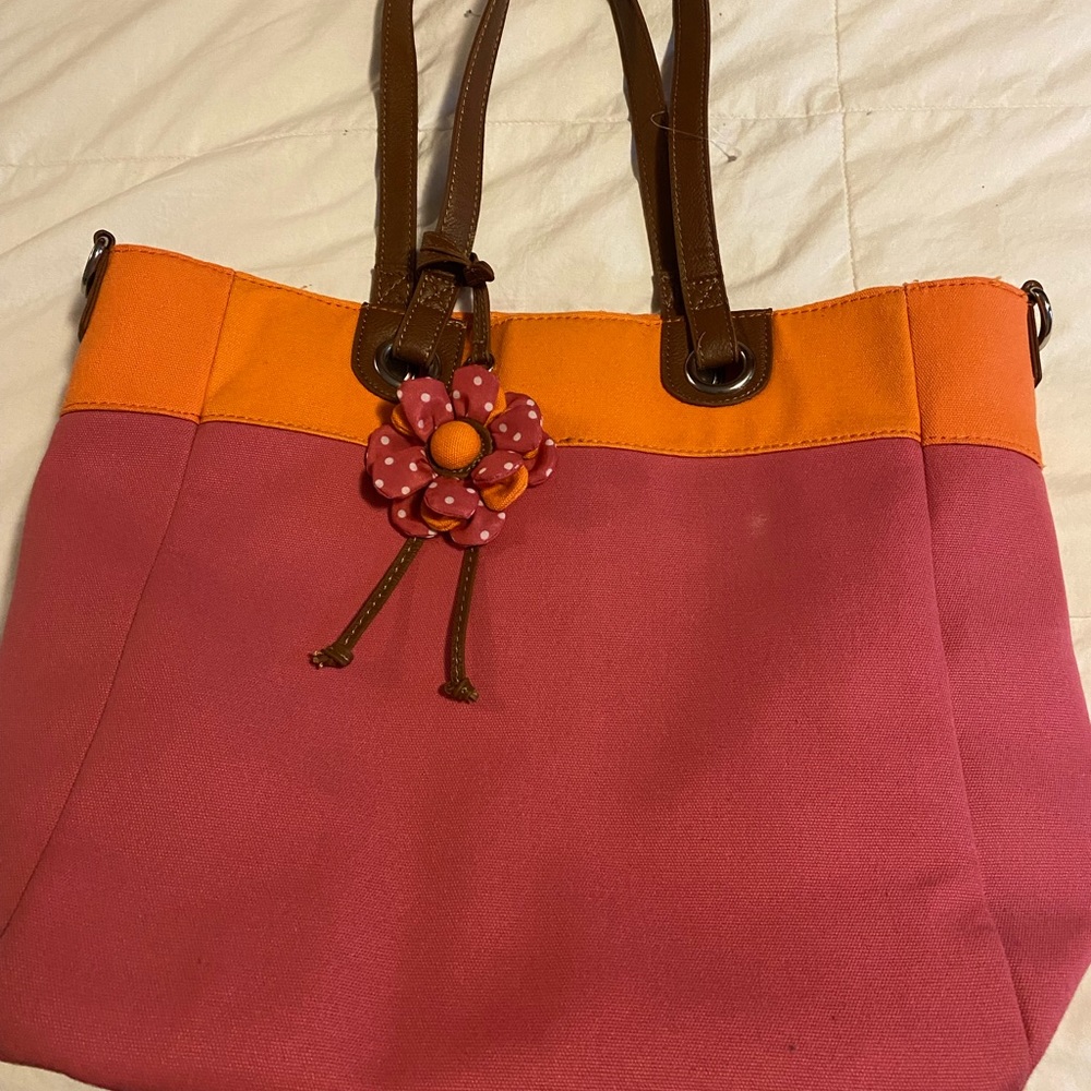 Clark’s over the shoulder bag. Large enough for a laptop and other necessities